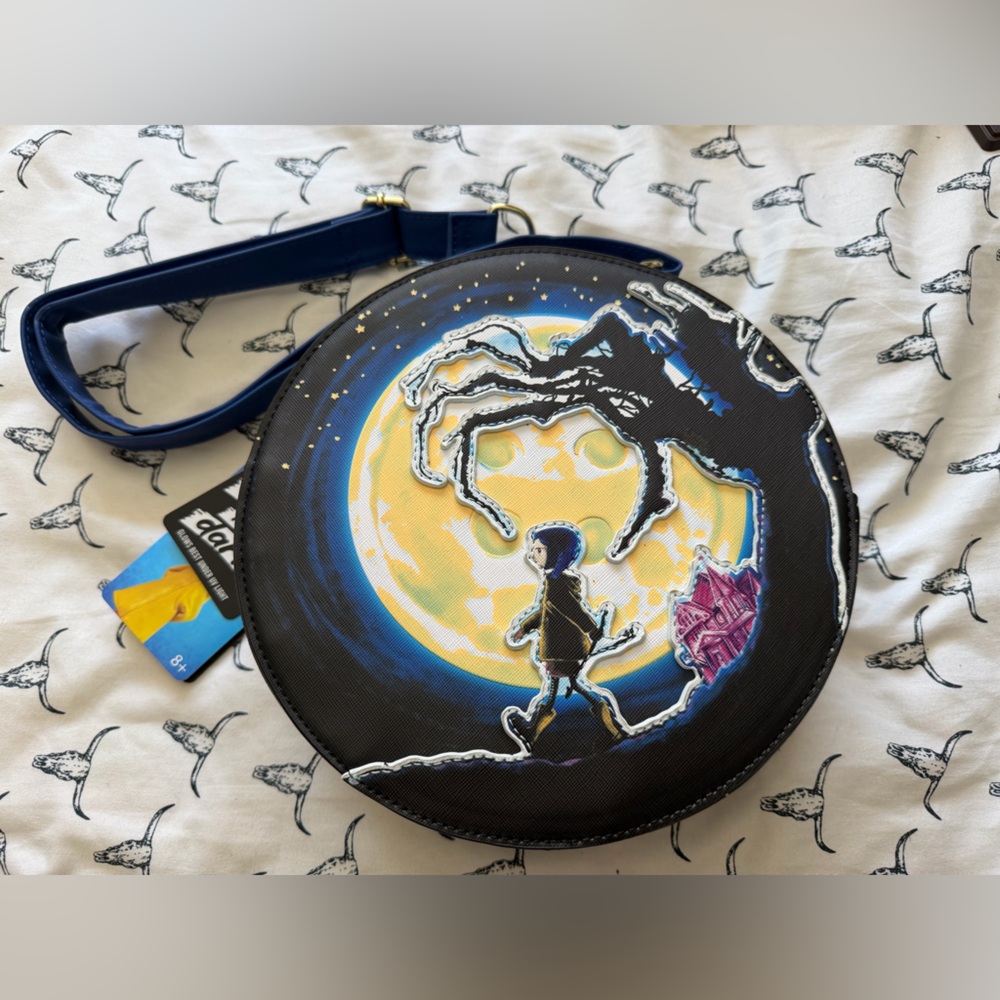 Loungefly Coraline Black, Yellow, Blue Glow-in-the-Dark Tag Crossbody